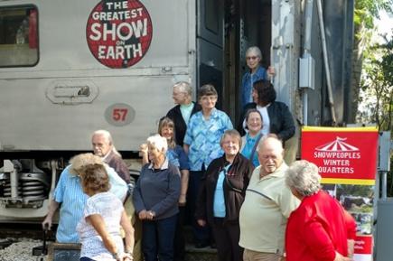 A few residents at Showpeople&#039;s Winter Quarters gather for the opening of the community center.